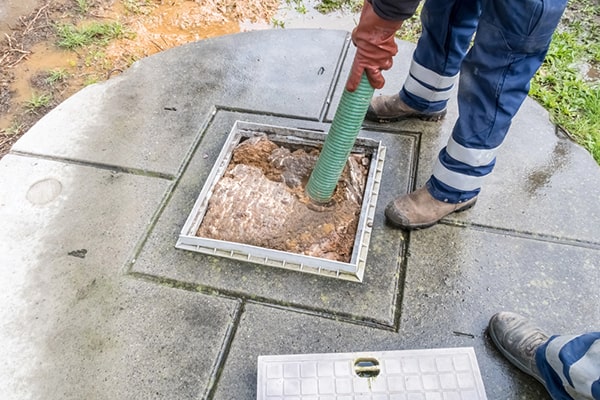 cesspool pumping involves removing solid waste and sludge from the cesspool using a vacuum truck